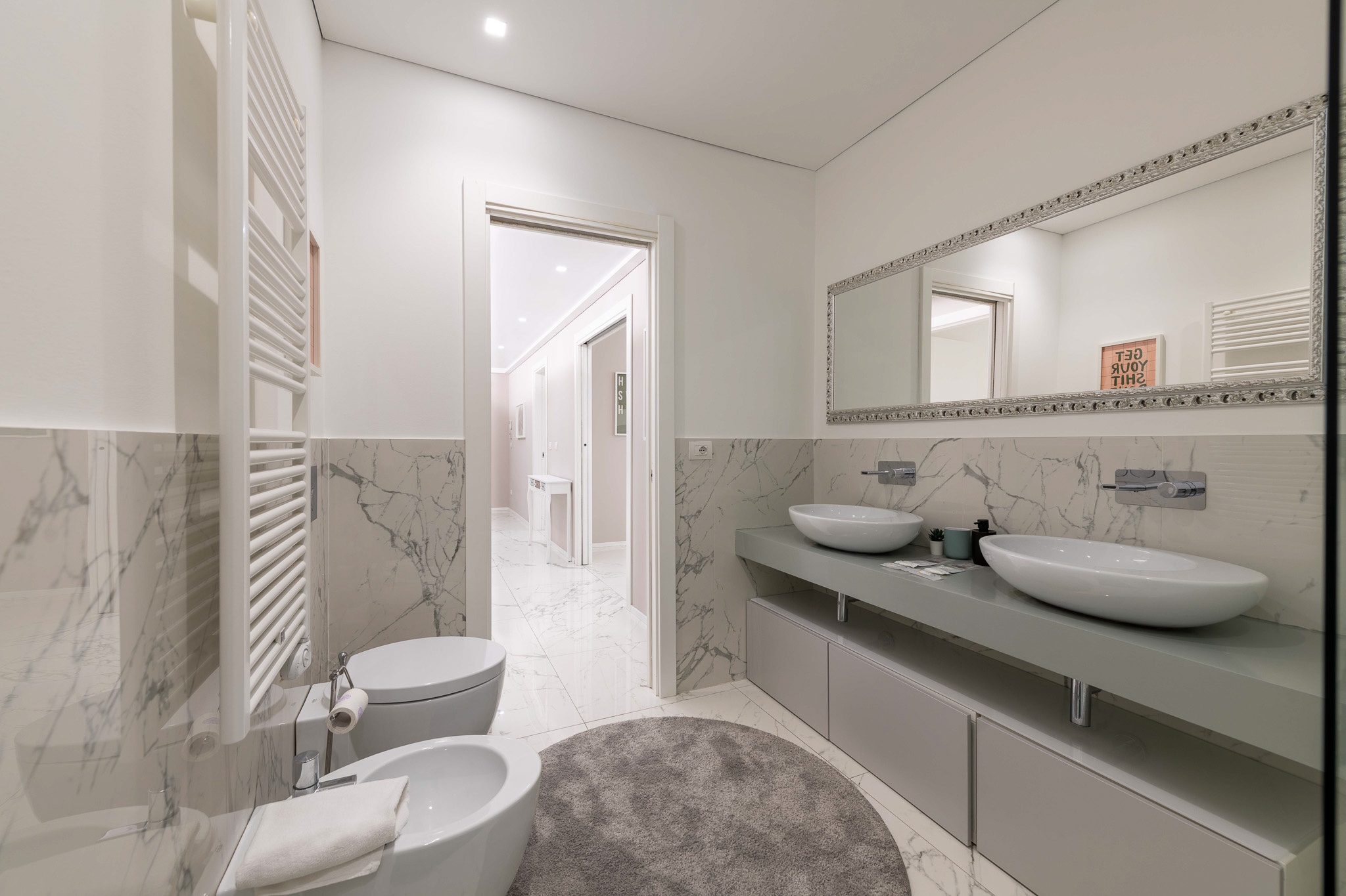 Second bathroom with double washbasin and bidet