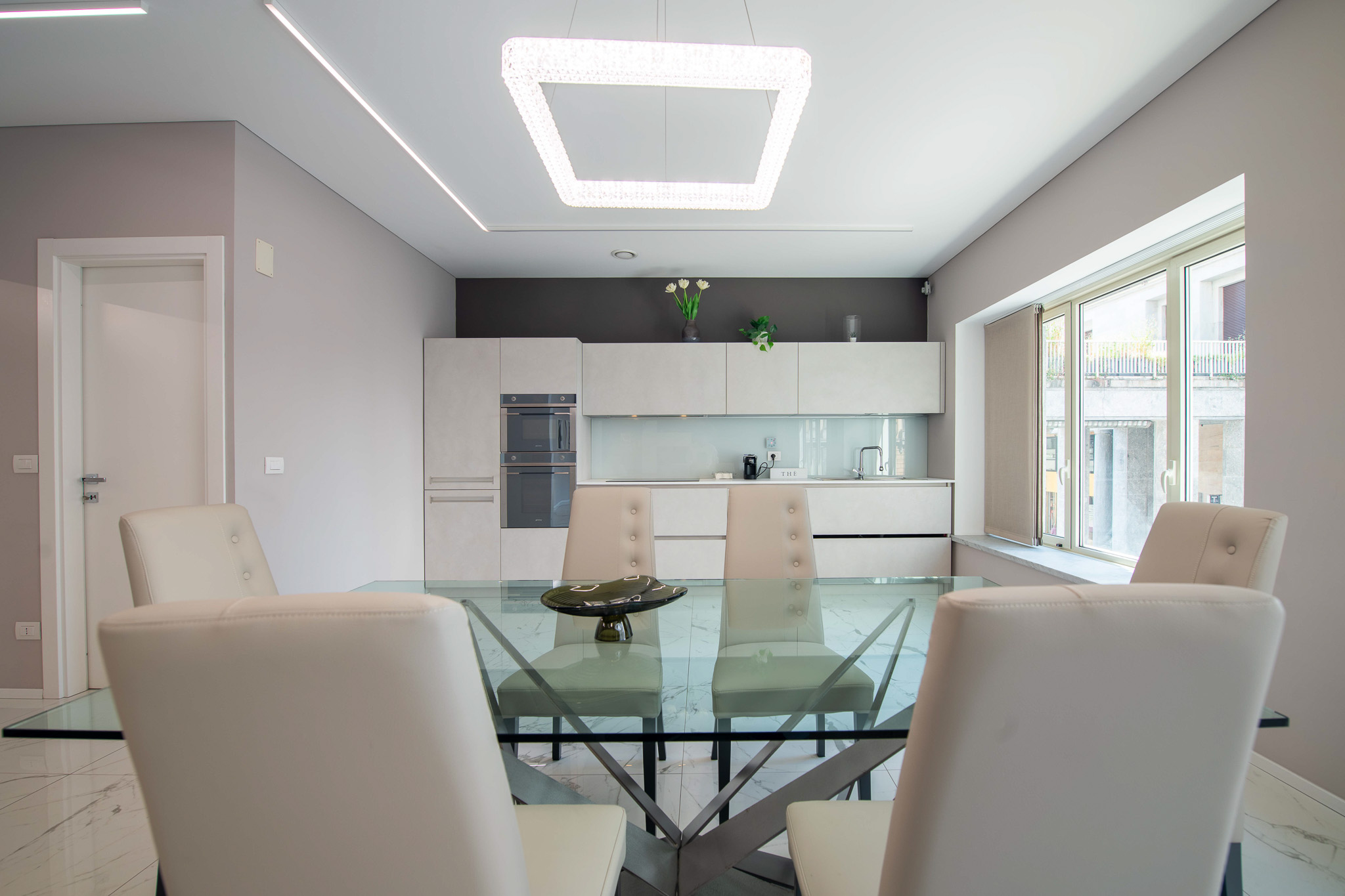 Linear kitchen and crystal dining table