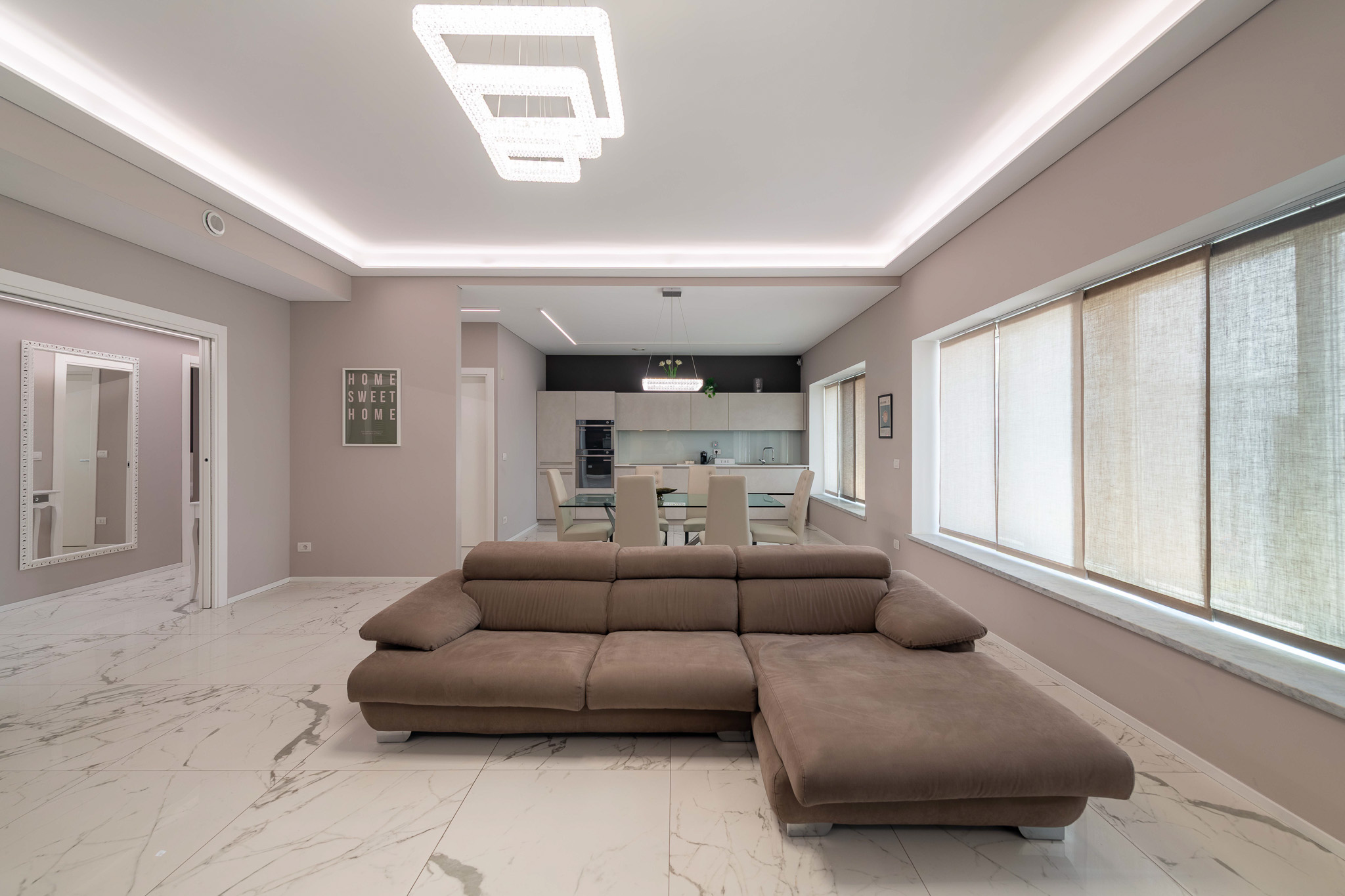 Living with modular sofa and kitchen in the background