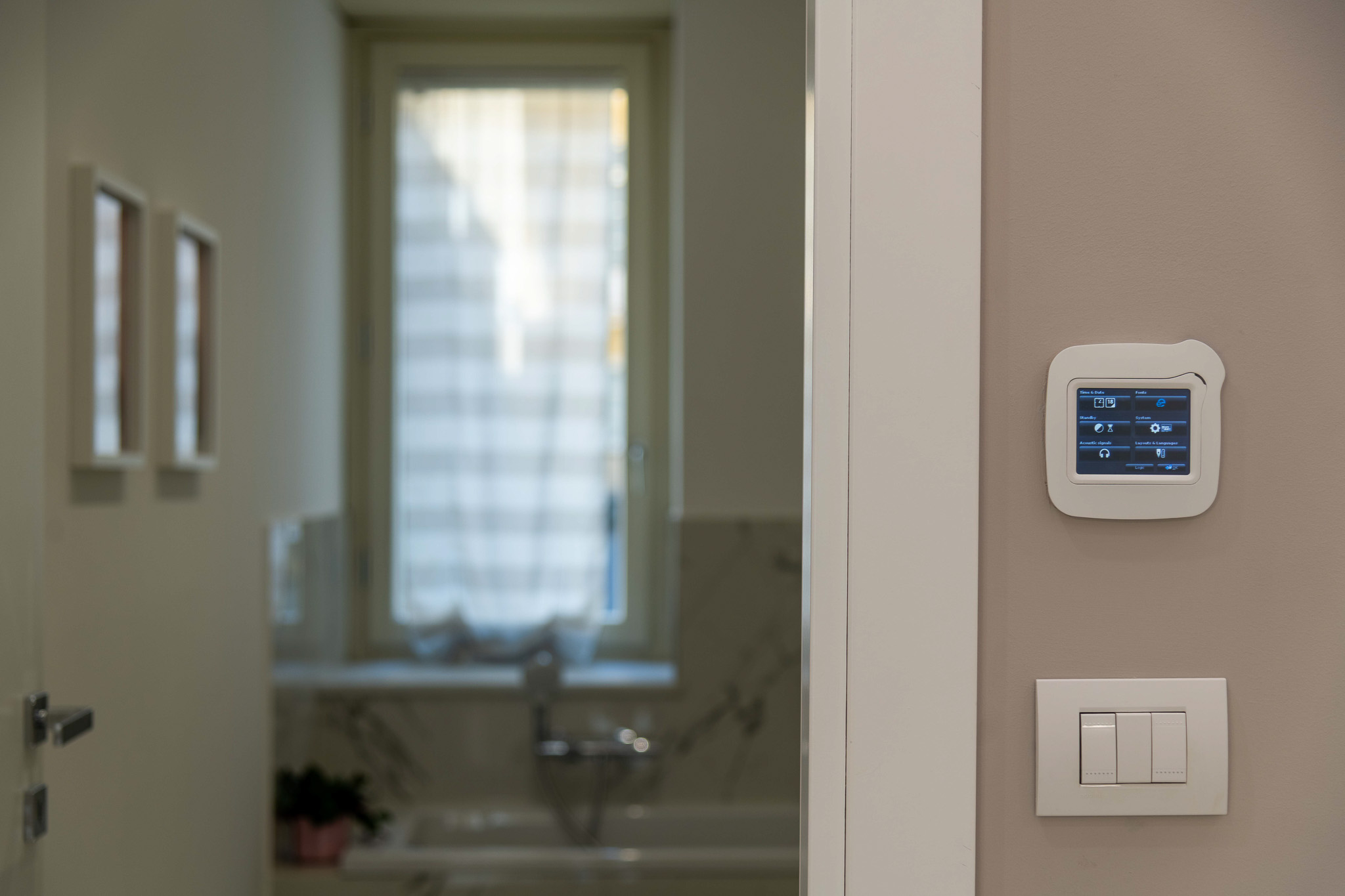 Home automation touchscreen and wall switches