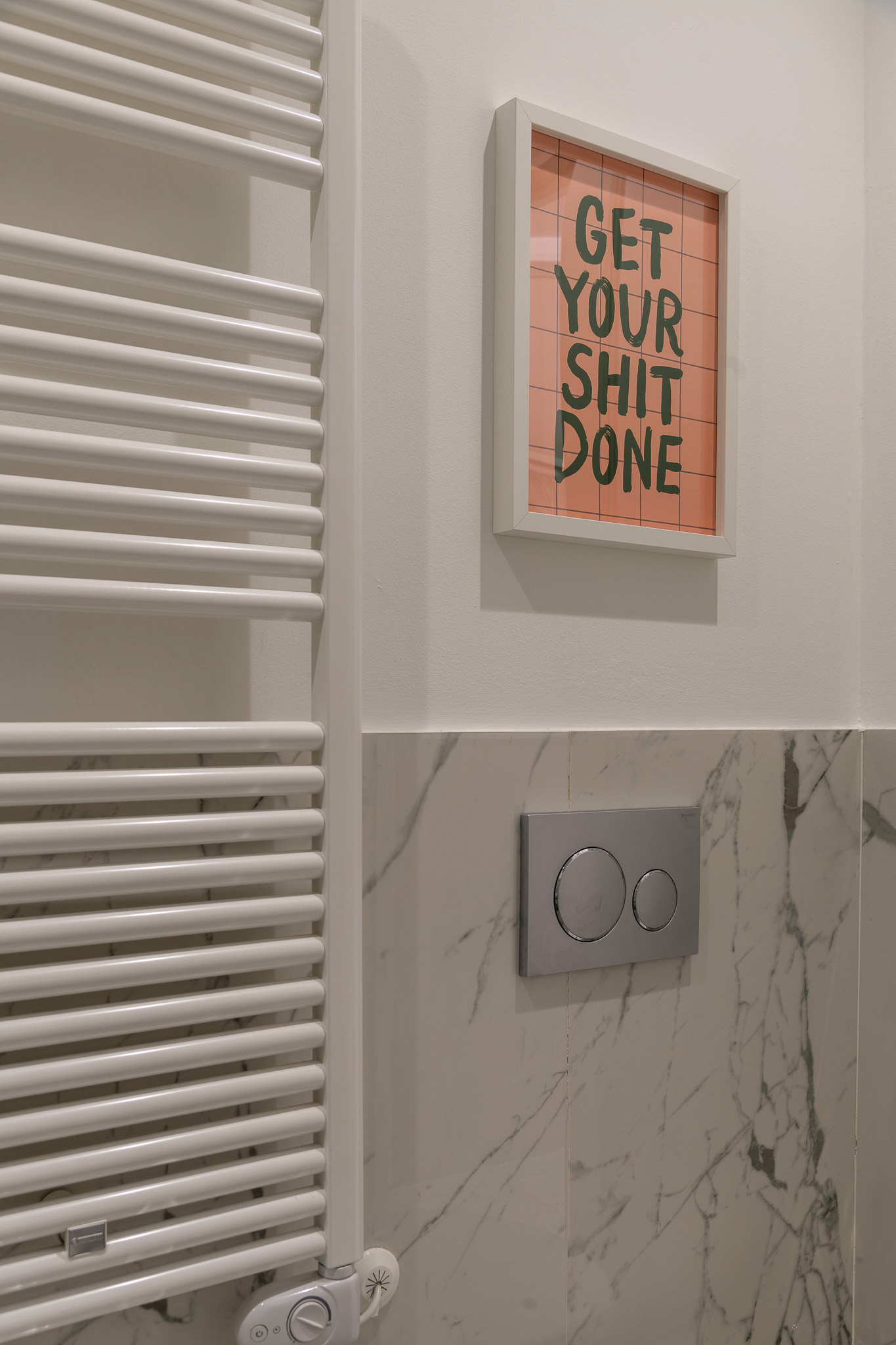 Bathroom detail: towel warmer and pop art print