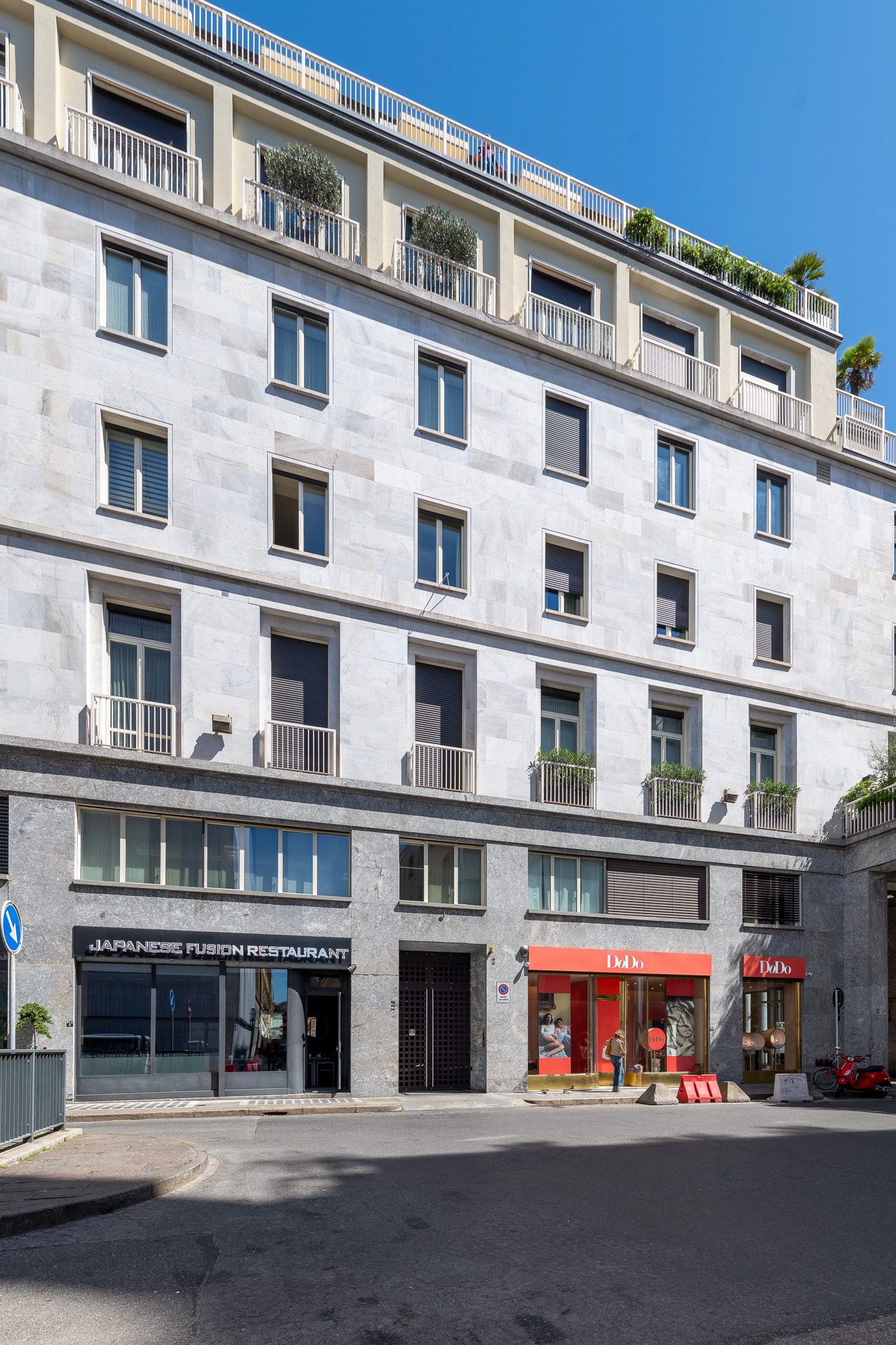 Historic five-floor stone facade of the building