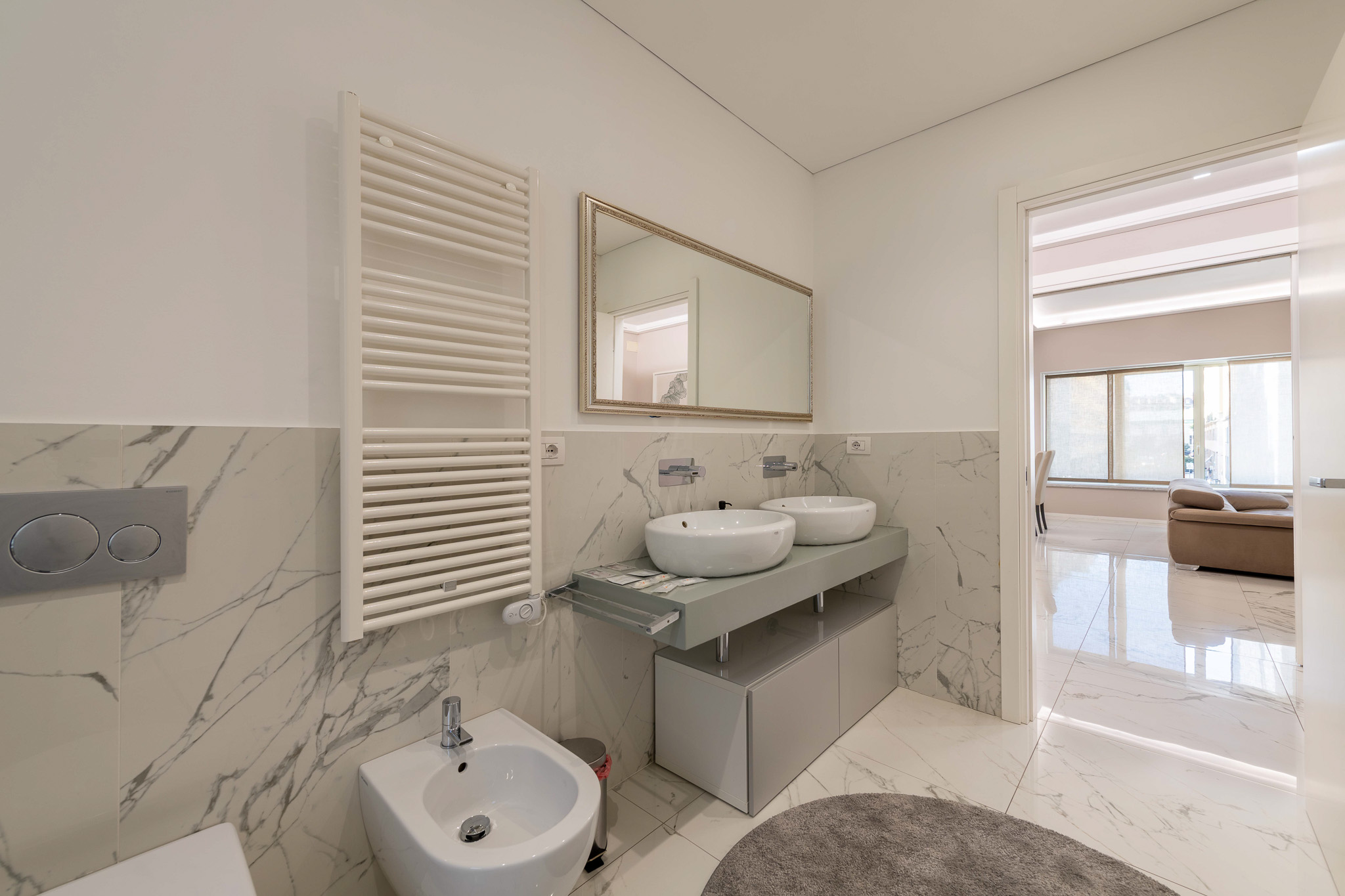 Main bathroom with view towards the living area